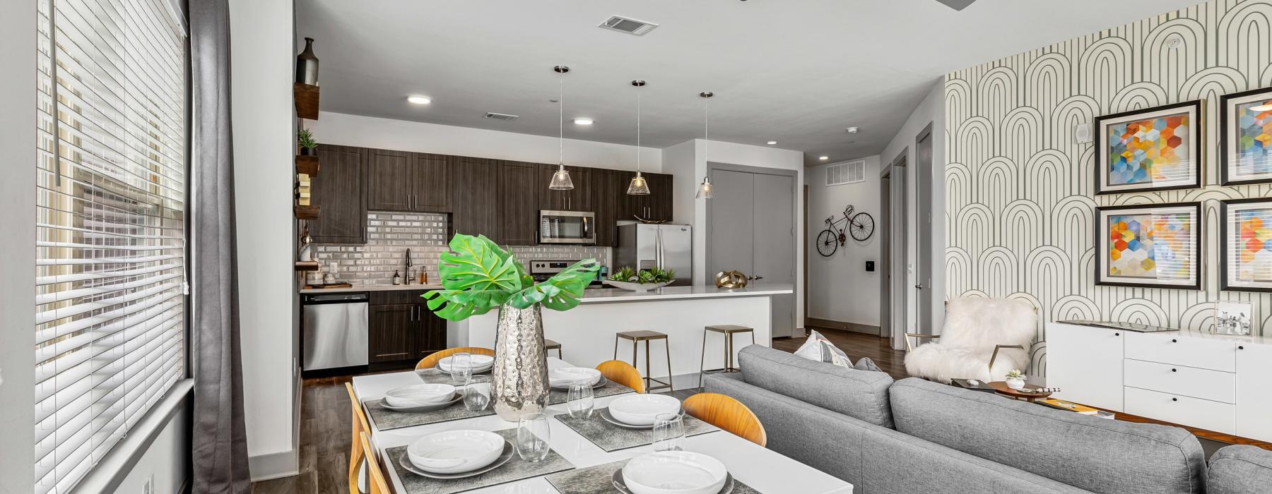 a large kitchen with a dining table