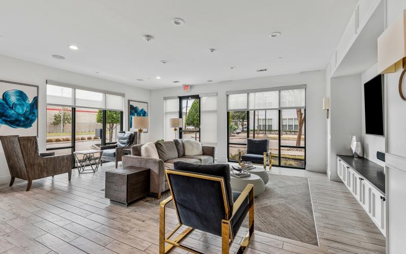 a living room with a large glass door